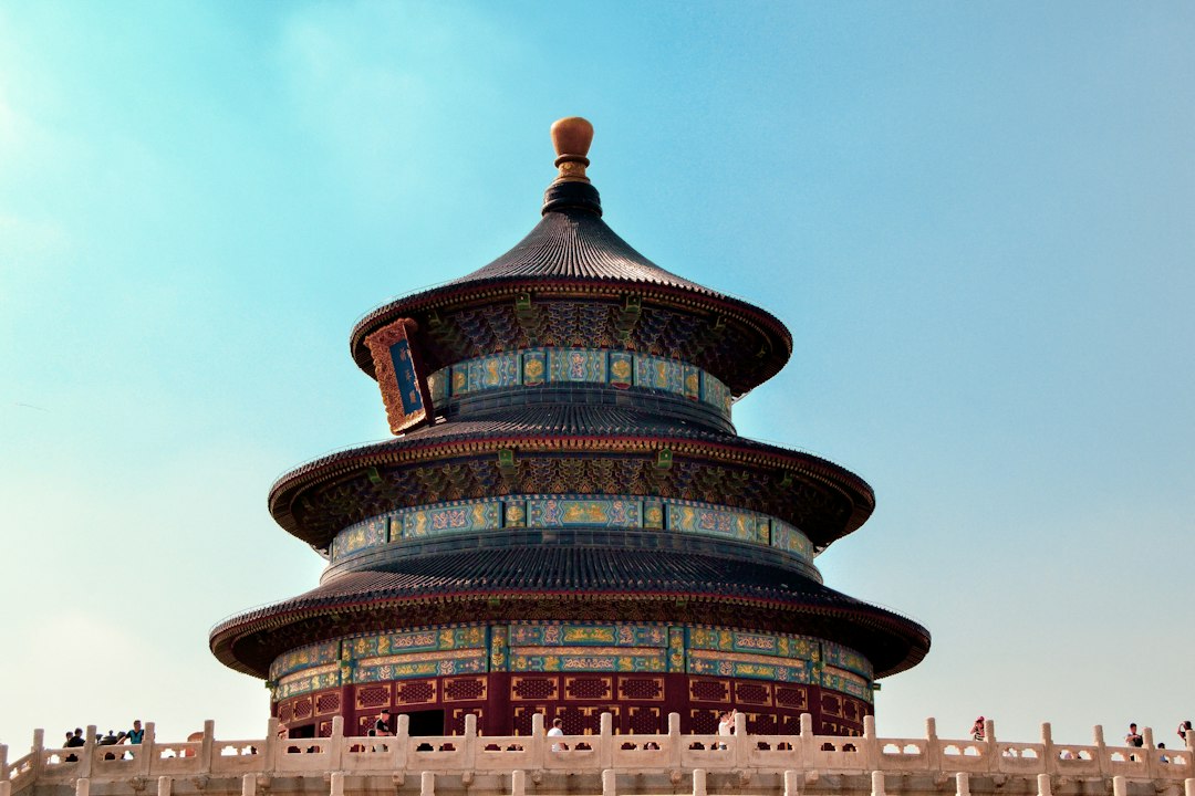 A tall building with a sky in the background