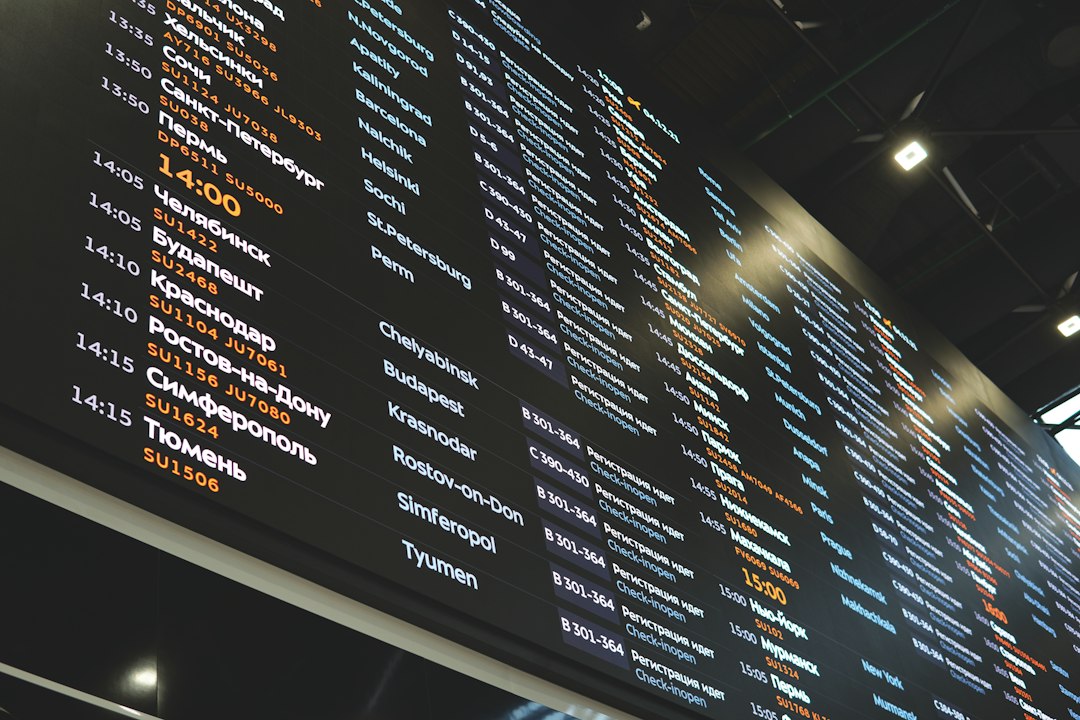 a large sign with a lot of different languages on it
