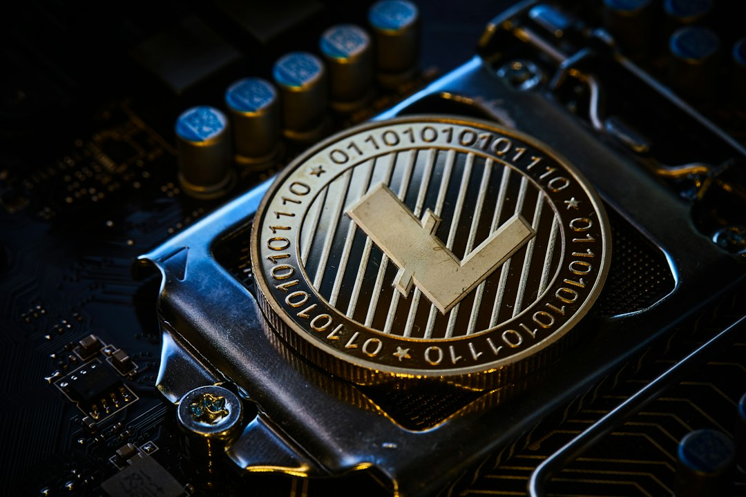 a close up of a computer chip with a tick symbol on it