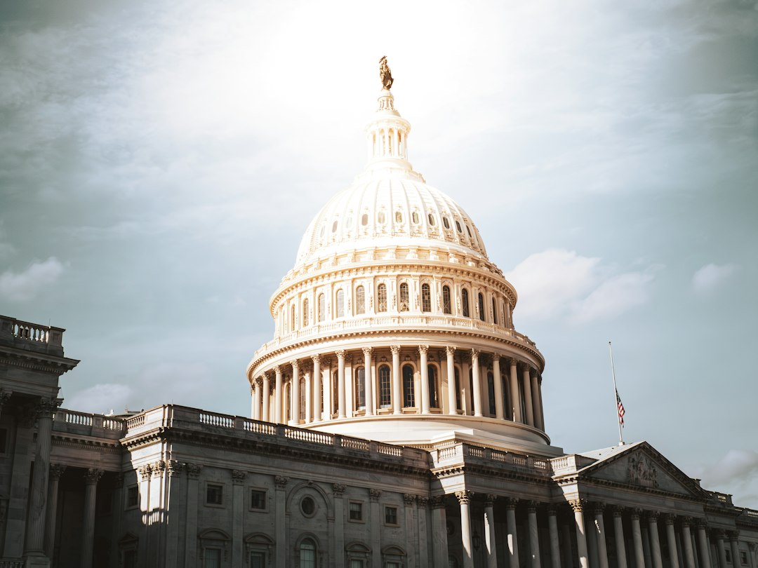 The united states capitol building under a cloudy sky