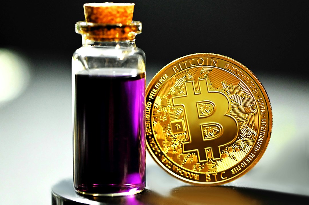 gold and purple glass bottle