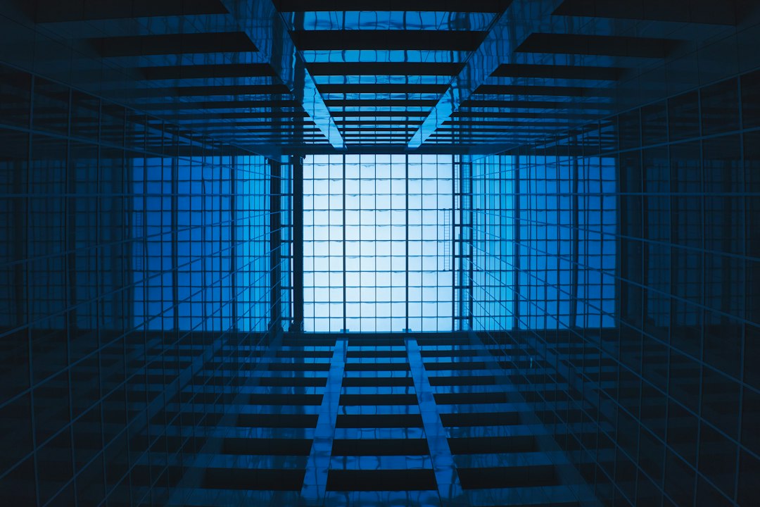 a very tall building with a big window in the middle of it