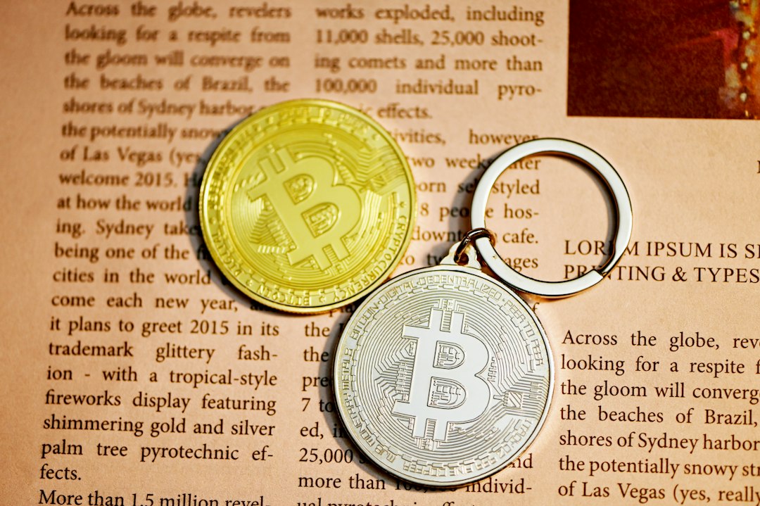 gold round coin on brown paper