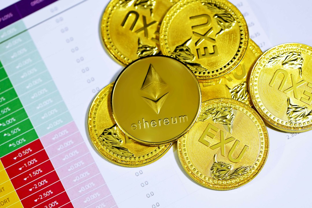 gold round coins on white paper