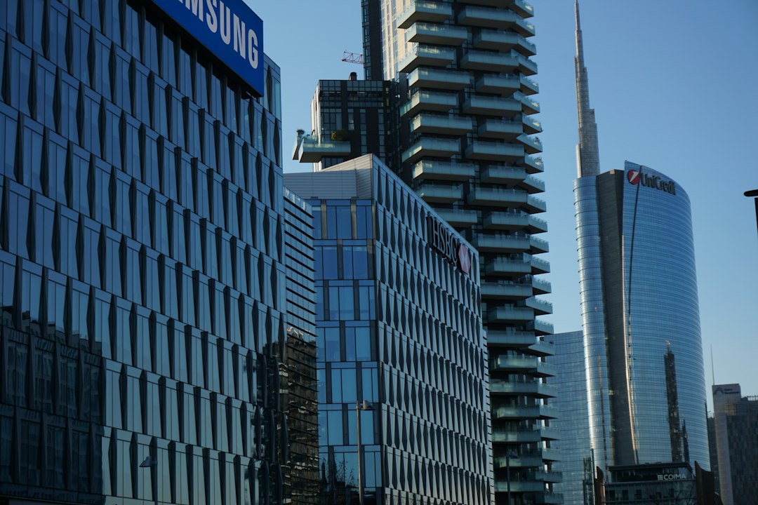 white and blue high rise building
