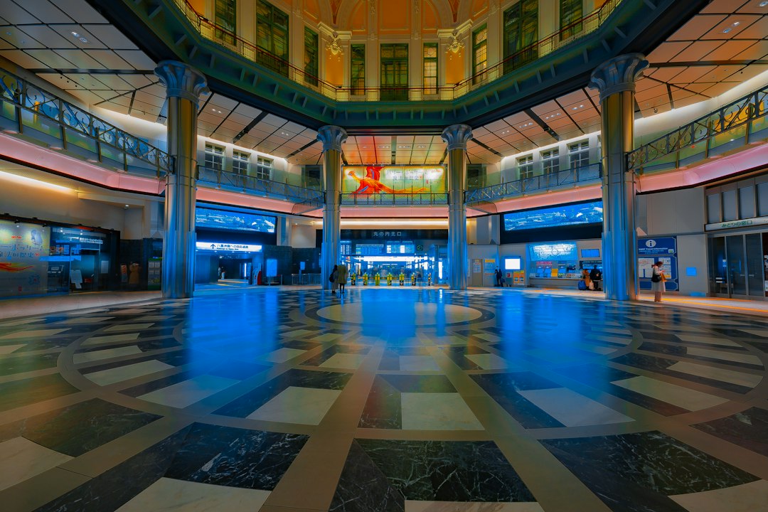 a large indoor mall with a large glass floor